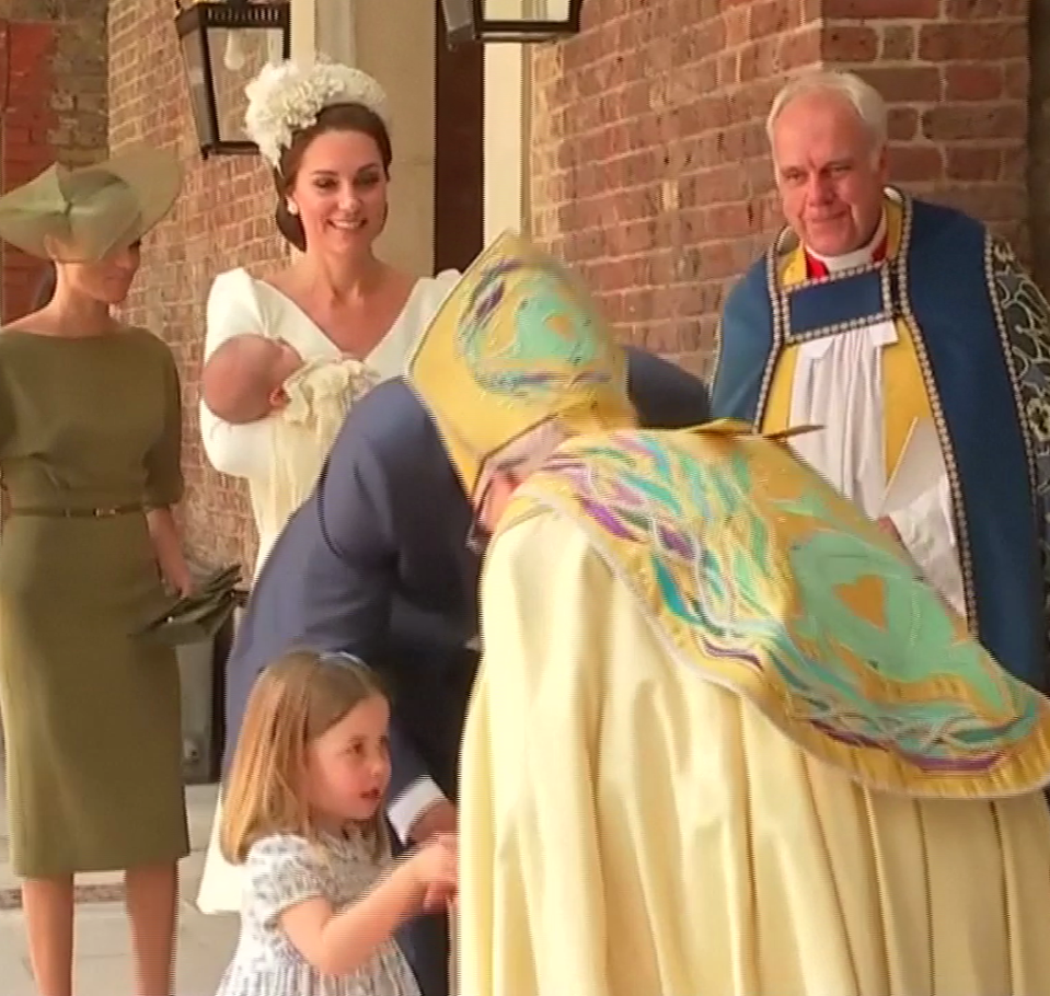  Princess Charlotte makes hearts melt with her little handshake with the Archbishop of Canterbury