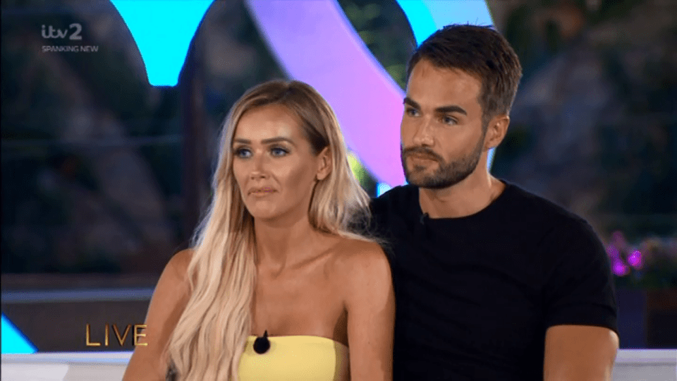 Laura gushed about her time on Love Island as Paul sat quietly beside her