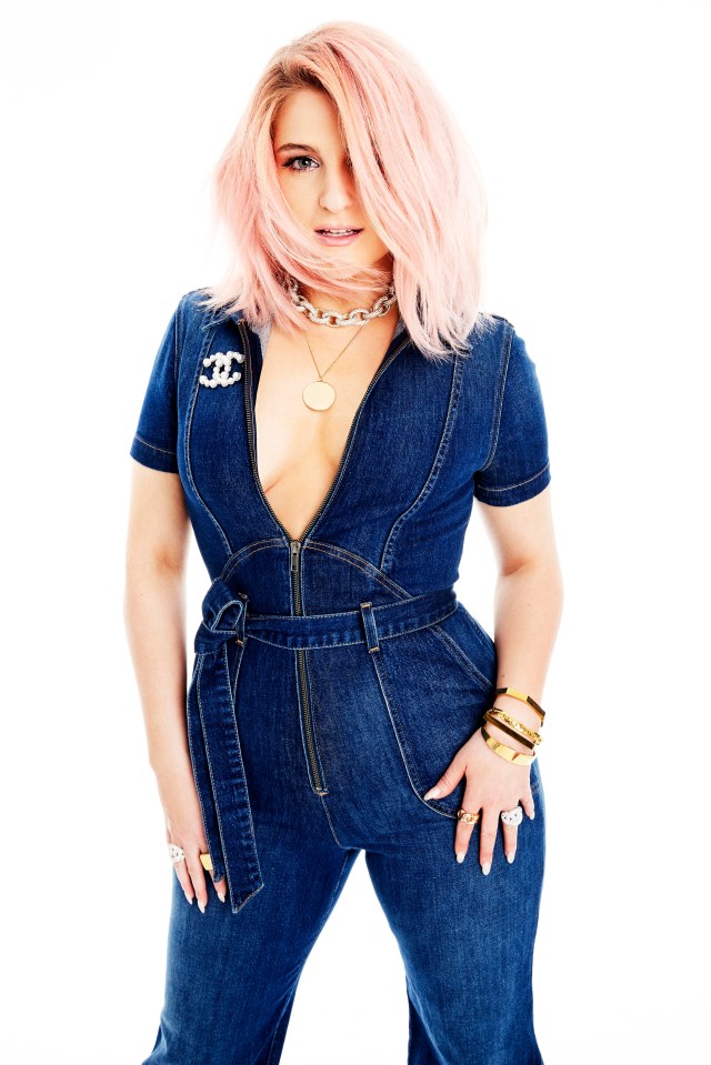 Meghan Trainor wows in a denim jumpsuit as she discusses how she never wanted to become the poster girl for curvy bodies