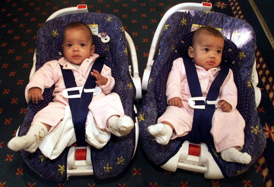  The twins - pictured in 2001 - were born in the United States and were sold twice over the internet