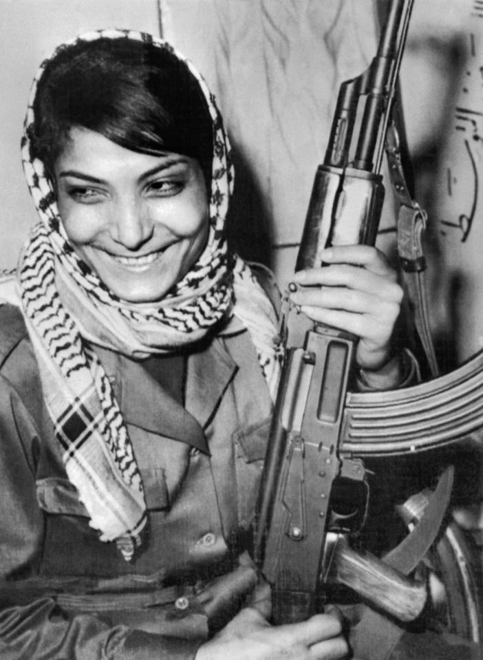  She became notorious for a picture of her in a headscarf and brandishing an AK-47