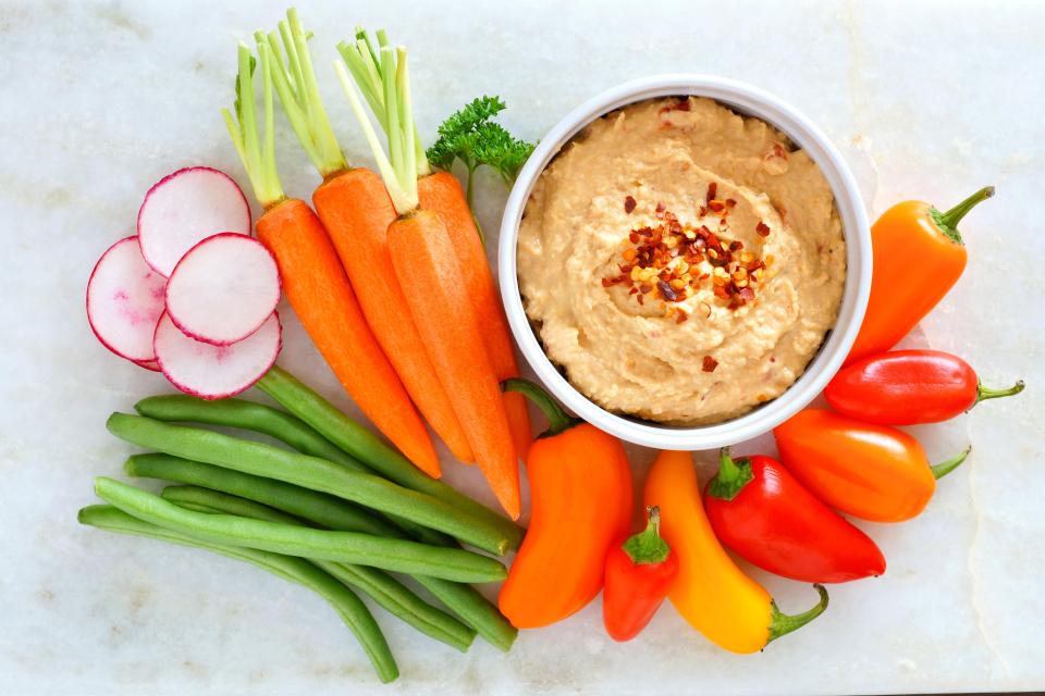  Hummus and veg - a healthier, more natural way to snack on protein