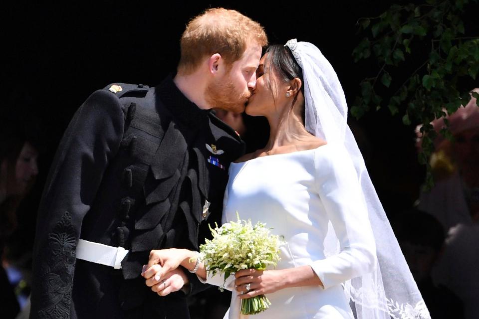  Prince Harry and Meghan kiss on their wedding day