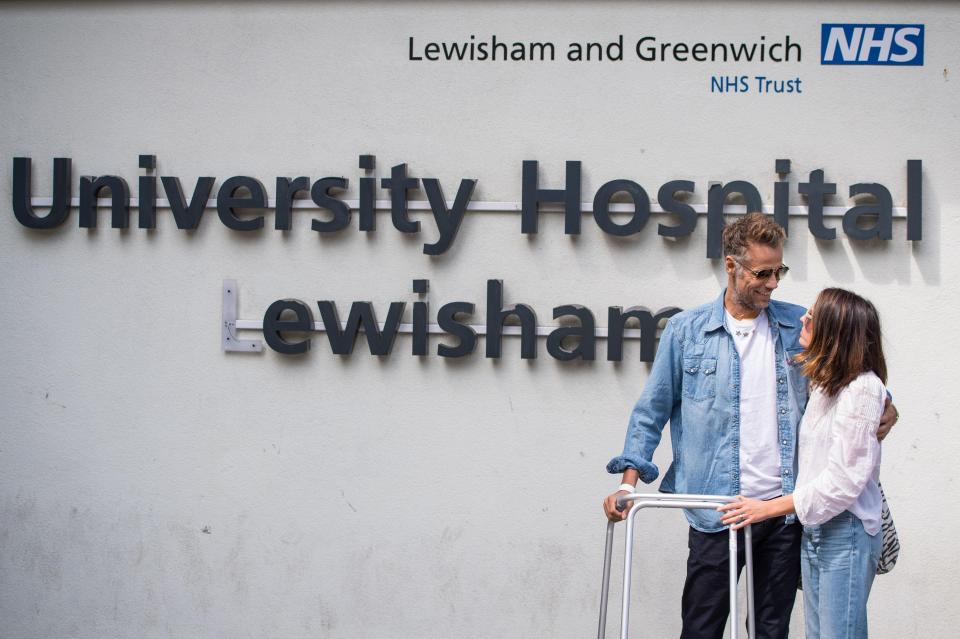  Richard and wife Rebecca outside the hospital that saved his life