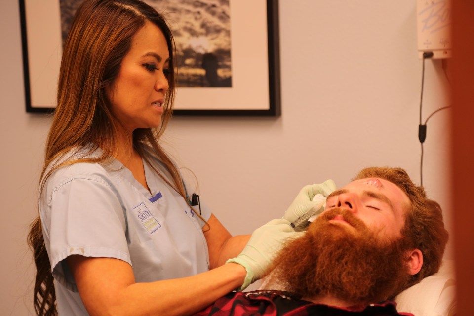 Dr Pimple Popper operating on Tyler Tilly in an episode of her new show