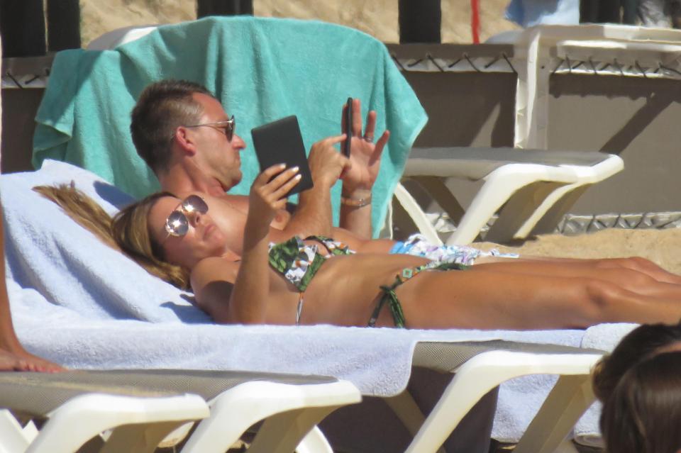  The couple relaxed on the sunbeds during their holiday in Portugal