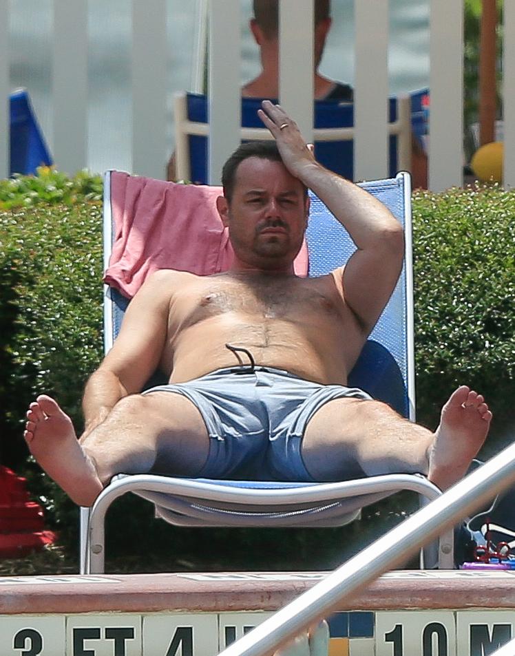 The EastEnders’ star was seen relaxing on a sun lounger in the shade