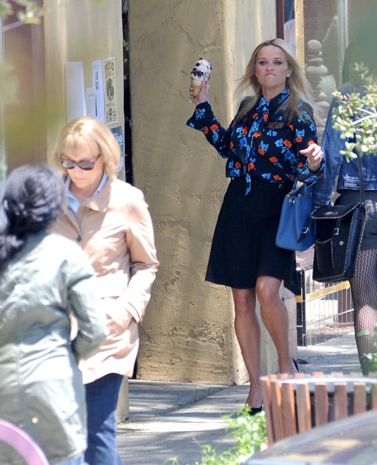  The pair were filming on the streets of Los Angeles, where Reese was spotted hurling an ice cream cone at Meryl