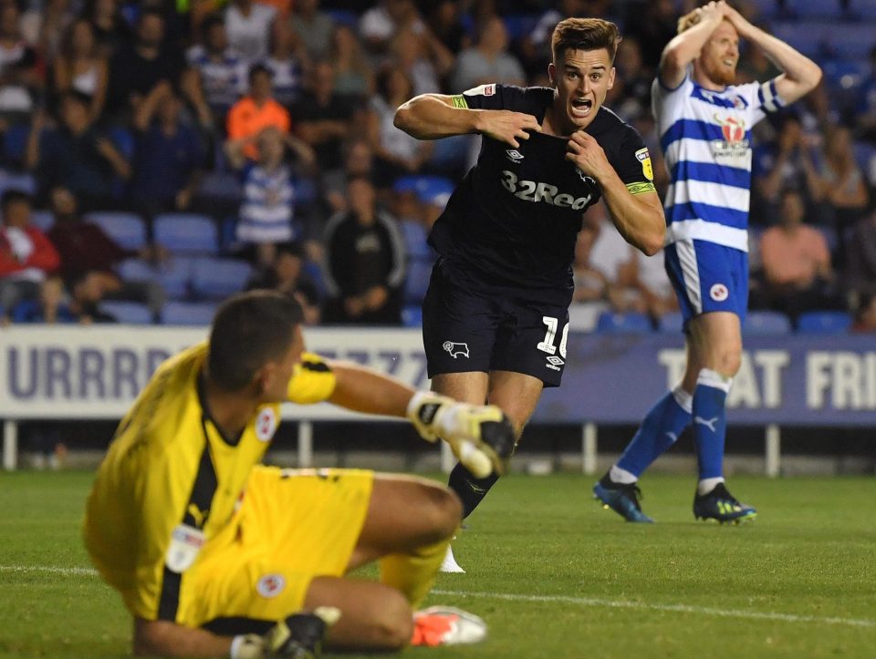  Lawrence wheels away in joy as the Reading defence is left heartbroken by the late goal