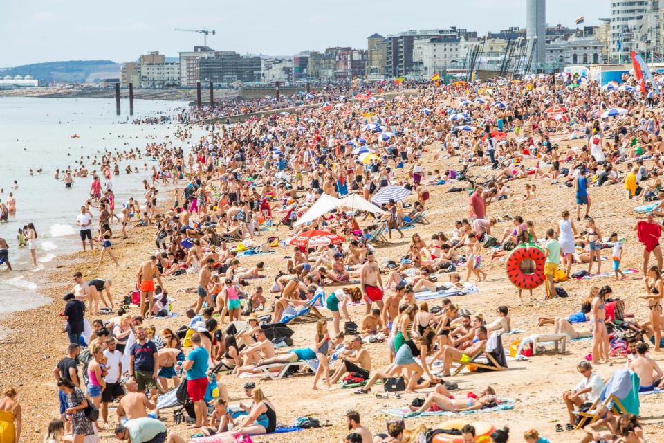  Thousands of people flocked to the beach in Brighton over the summer