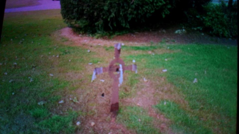  Condoms were also left hanging from a small cross in the garden and strewn across the lawn