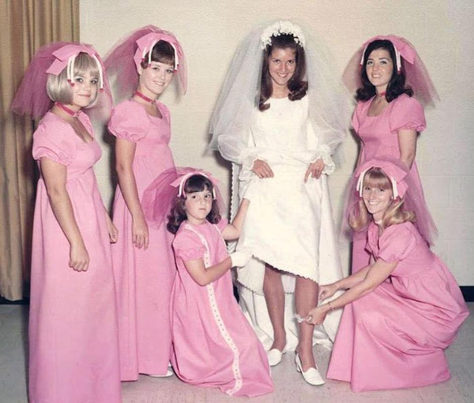  This '70s bride has chosen some quirky hair pieces for her bridesmaids