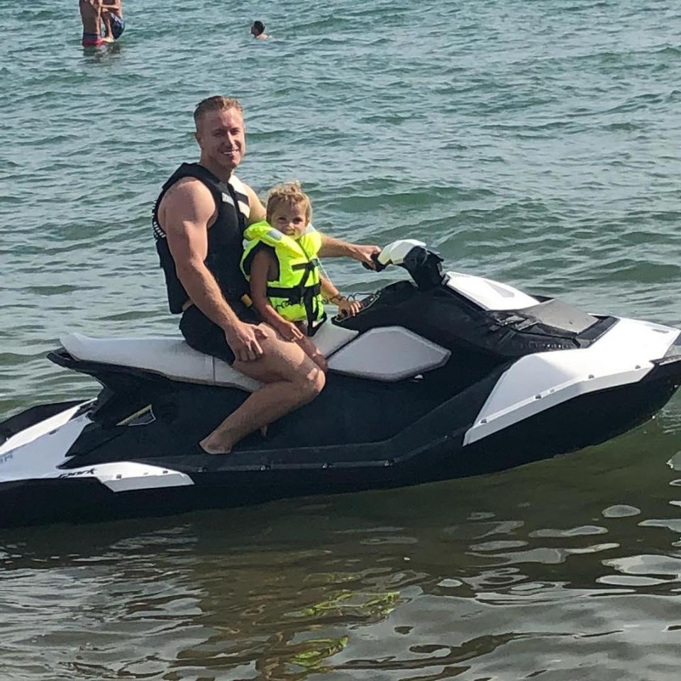  Katie Price's hunky new boyfriend Kris Boyson has been showing off his moves on a jet-ski - and given Kate's adorable kids endless rides over the water