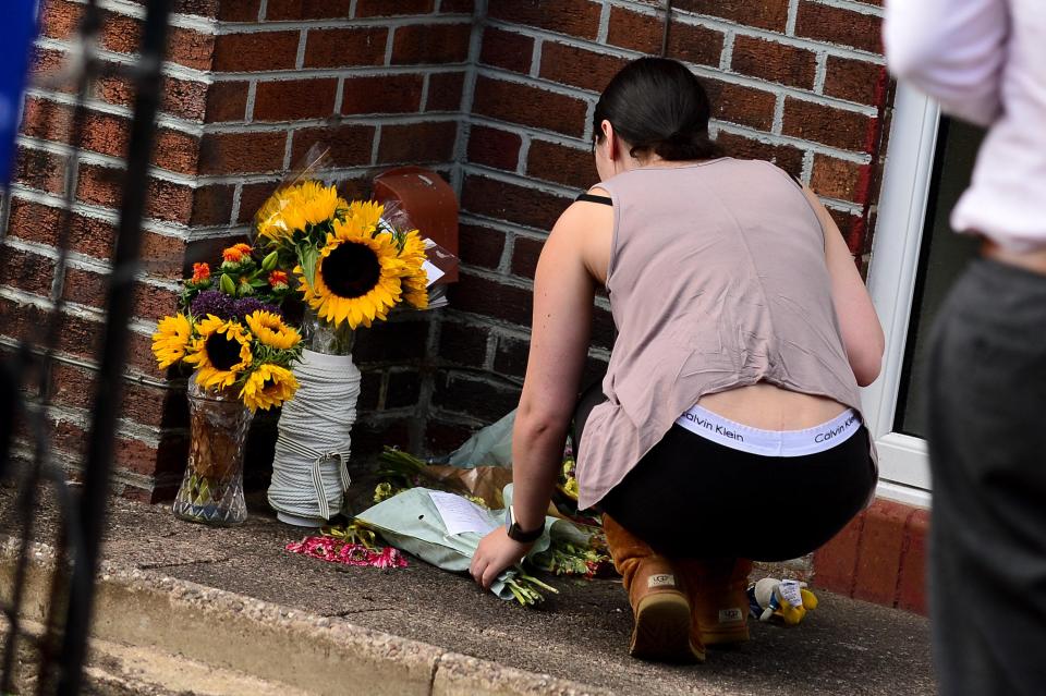  Sister Gemma Eastwood arriving at her sisters house on Greenside Ave in Stoke on Trent, where she laid flowers and read tributes