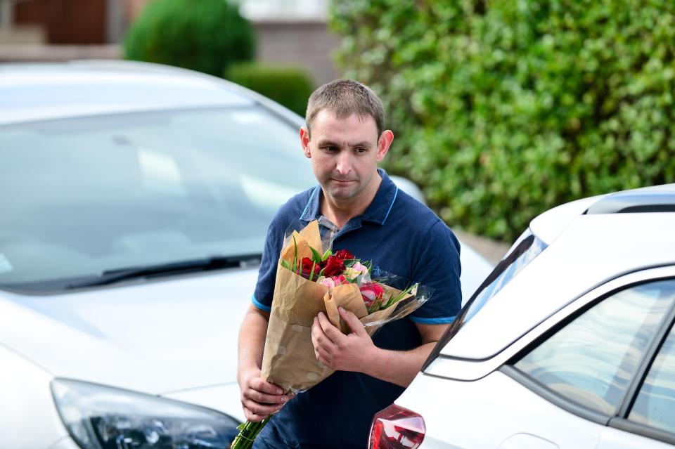  John Peake former fiancé of murdered midwife Samantha Eastwood visiting her house with flowers