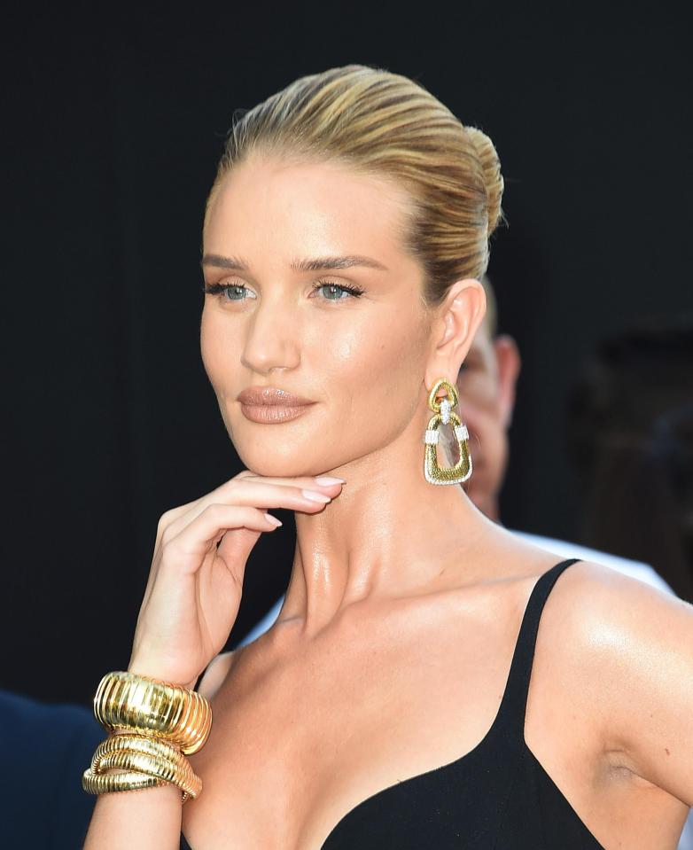  The 31-year-old accessorised with gold earrings and chunky gold bracelets