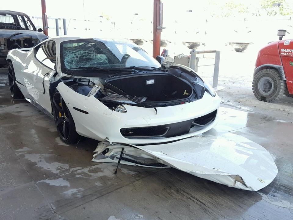  A Ferrari worth £220,000 had its bonnet ripped off and windscreen smashed as sledgehammer-wielding thugs targeted the most expensive cars