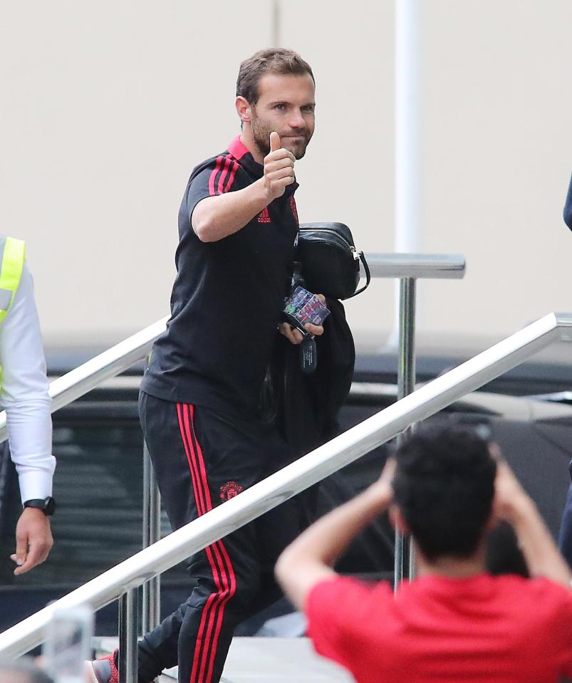  Juan Mata cut a far more relaxed figure as he gave the thumbs up