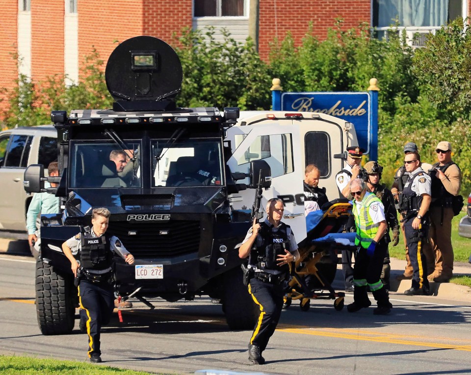 Armed police in action at the scene of today’s mass shooting