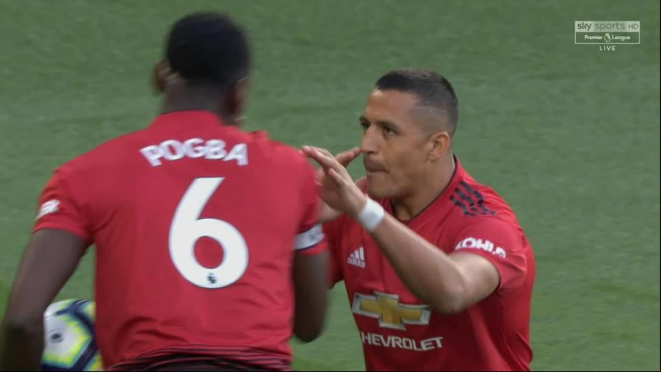  Alexis Sanchez tried to grab the penalty off of Paul Pogba