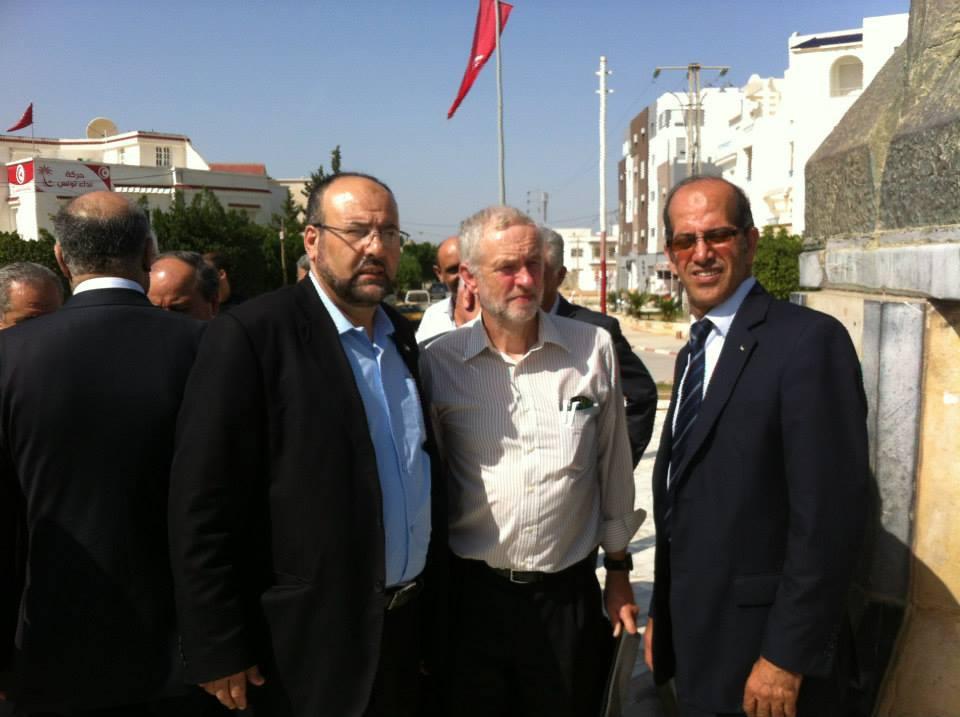  Jeremy Corbyn with members of a Palestinian Conference delegation during his visit to the cemetery in Tunisia