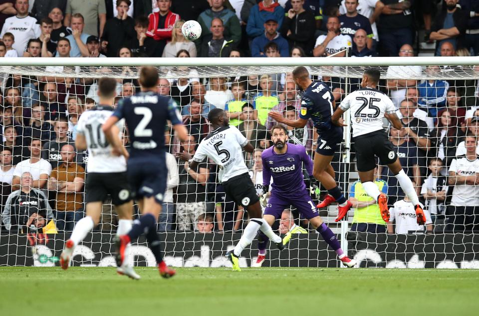  Kemar Roofe smashes home his second and Leeds' third goal