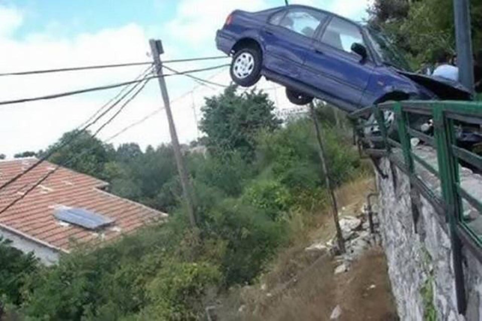 Things could have turned disastrous for the driver of this car if it wasn’t wedged in the railing