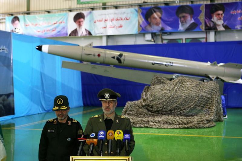  Iranian Defence Minister Amir Hatami unveils the new Bright Conqueror guided missile