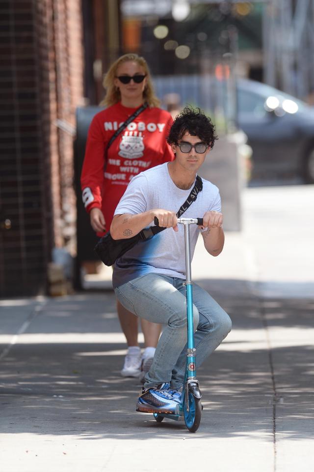  Musician Joe showed off her scooter skills for the photographers