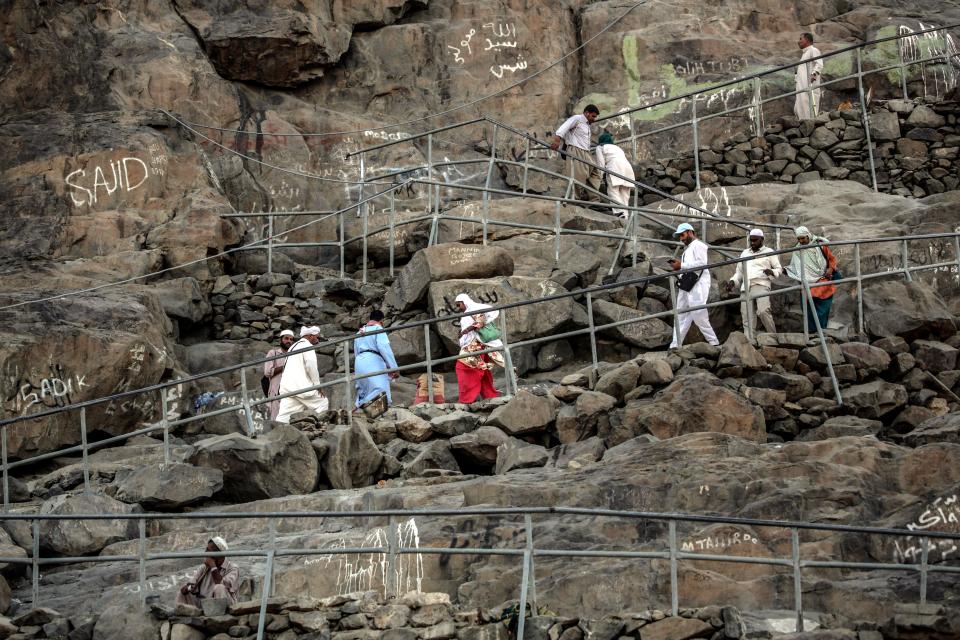  Pilgrims climb the Jabal Al-Noor “ Al Noor mountain” to visit Hiraa cave during the Hajj pilgrimage in Mecca