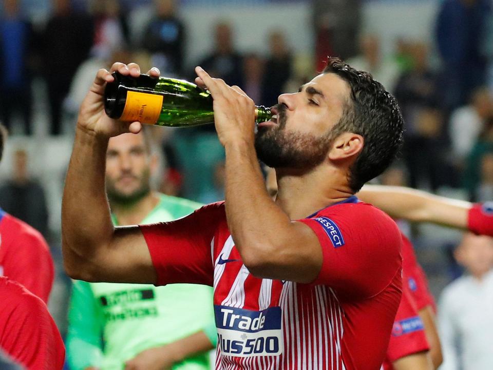  Two-goal Costa enjoys a hard-earned drink