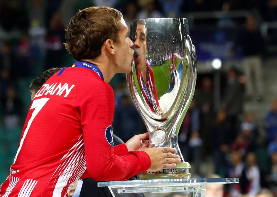  Antoine Griezmann gets acquainted with another trophy after winning the World Cup with France