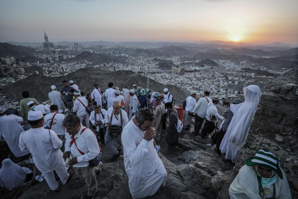  Hajj pilgrims stand at the top of Jabal al-Nour mountain