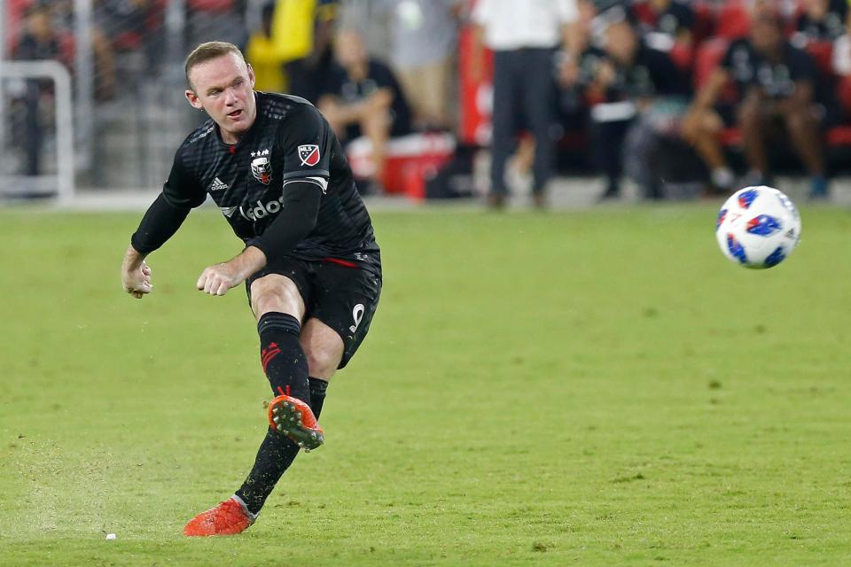  Man United legend Wayne Rooney bent home his second with a free-kick