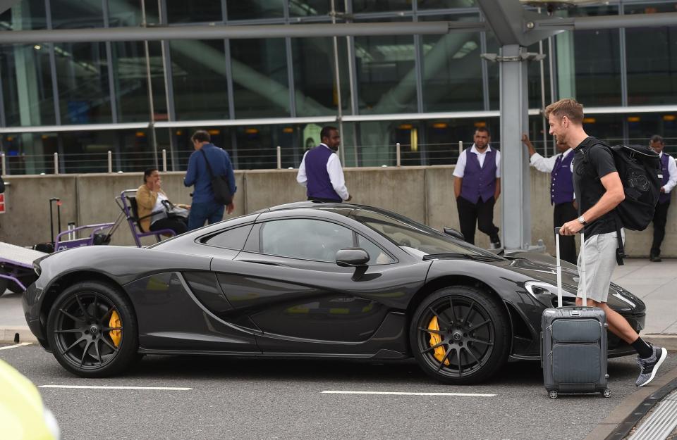  The special car was waiting for Button as he arrived in the UK