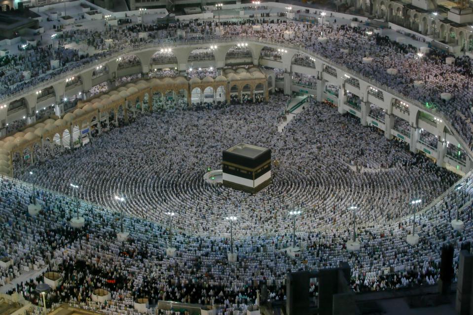  Pilgrims perform evening prayer around the Kaaba, Islam's holiest site