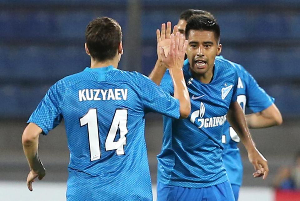  Christian Noboa celebrates scoring with team-mate Daler Kuzyayev