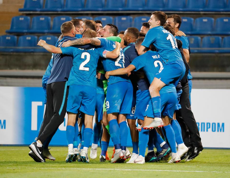  Stars of the Russian side celebrate their historic comeback at the end of extra-time