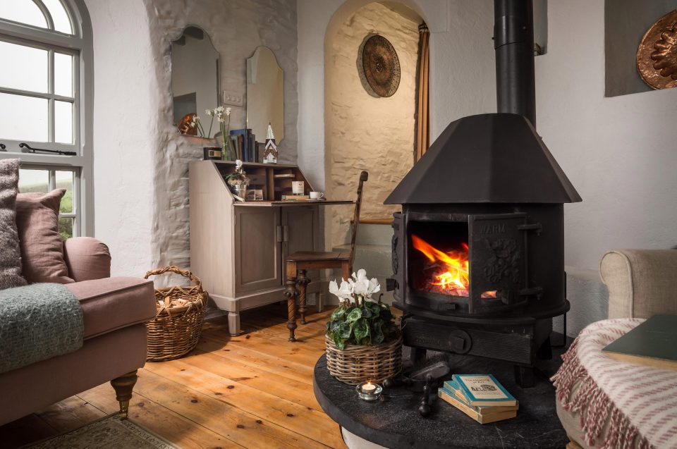  The woodburner makes the living room snug