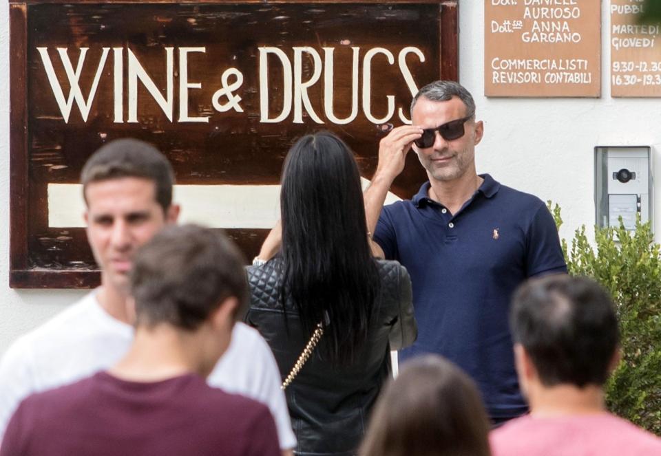  And Kate, 34, marked their trip away by taking a cheeky pic of Giggs, 44, next to a sign bearing the words 'WINE & DRUGS'