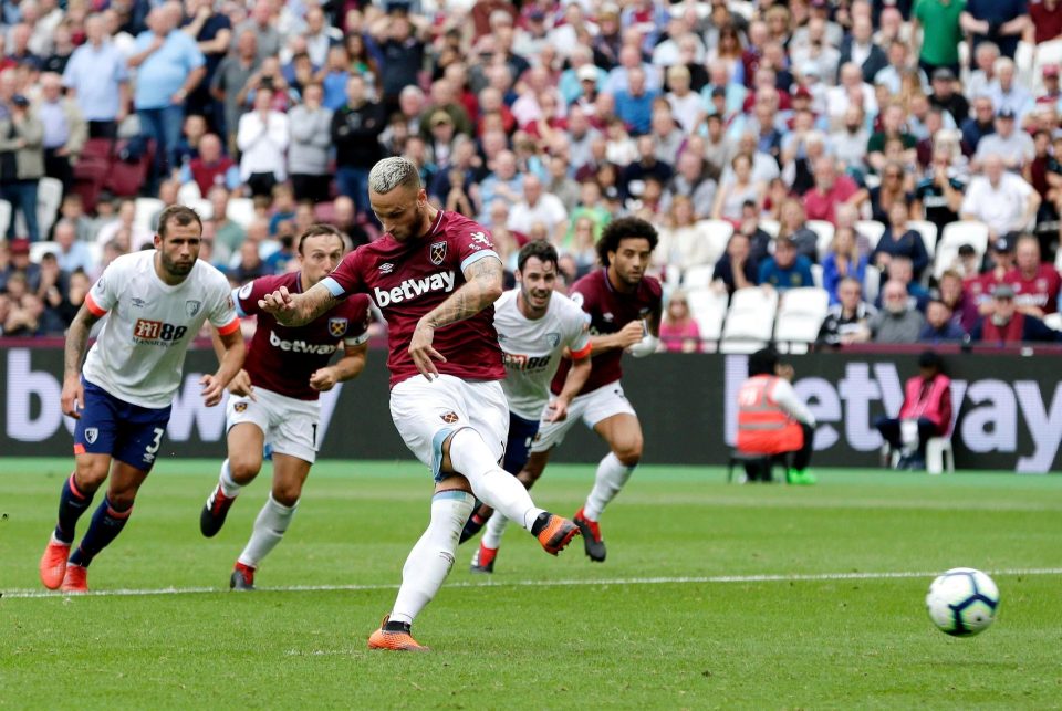  Marko Arnautovic drills home the penalty opener for West Ham just before the interval