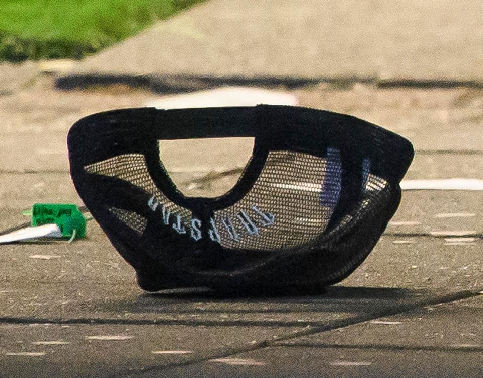  A baseball cap at the scene of the shooting