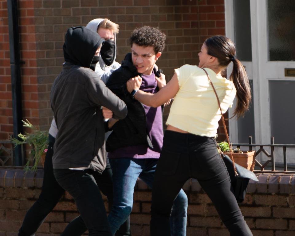  Kate Connor saves Simon from Tyler's gang in Corrie