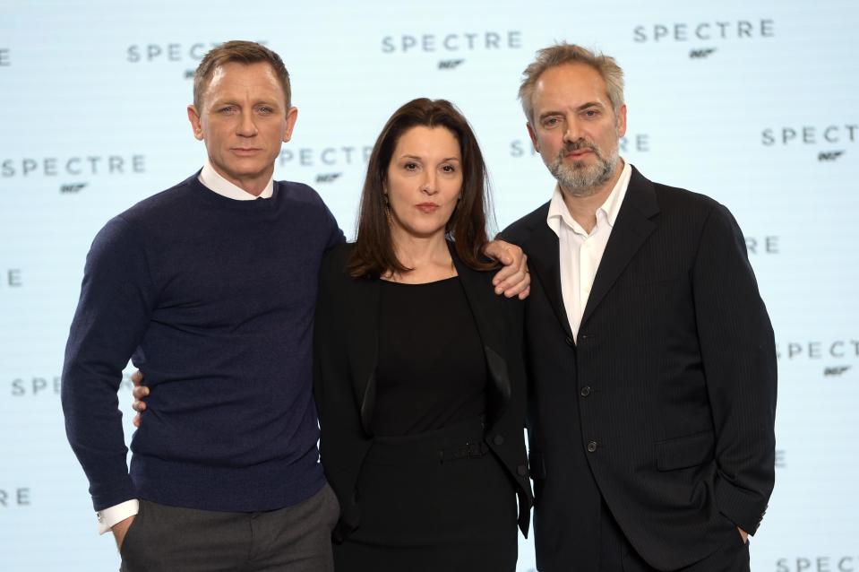  Daniel Craig, pictured with producer Barbra Broccoli and Spectre's Sam Mendes, is claimed to have refused to return for Bond 25 if the director was returning too