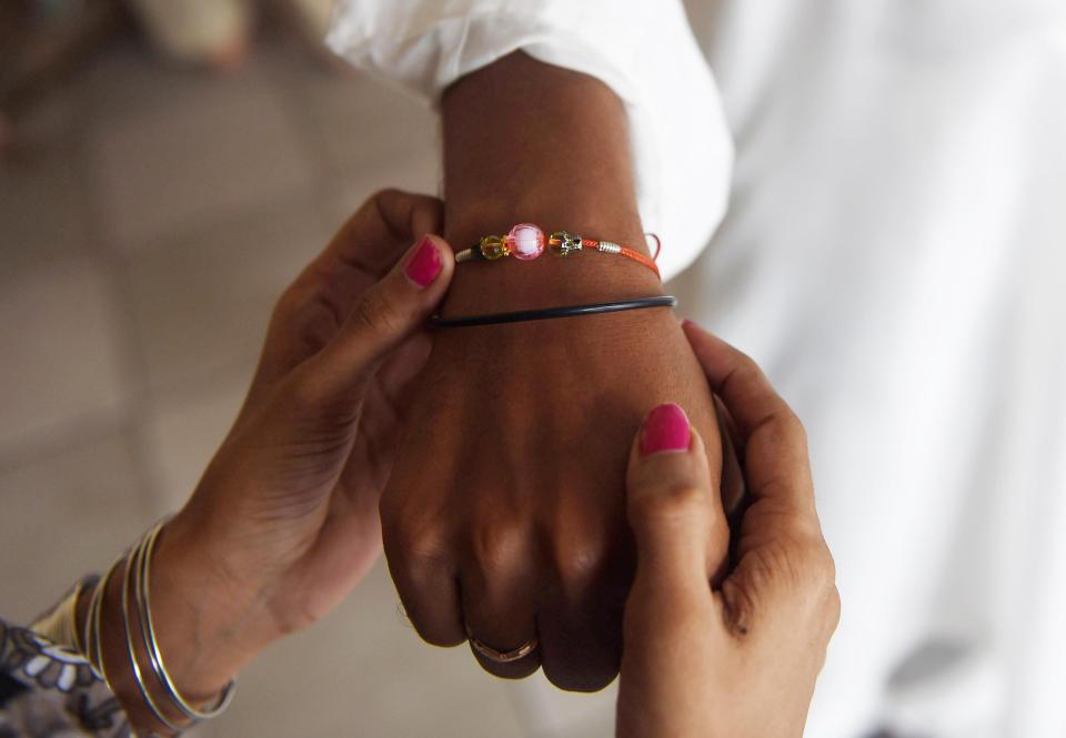  The rakhi or sacred thread symbolises a bond of protection between siblings