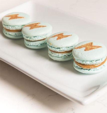  These baby blue macarons are also butterbeer flavoured and topped off with a glitter lightning bolt