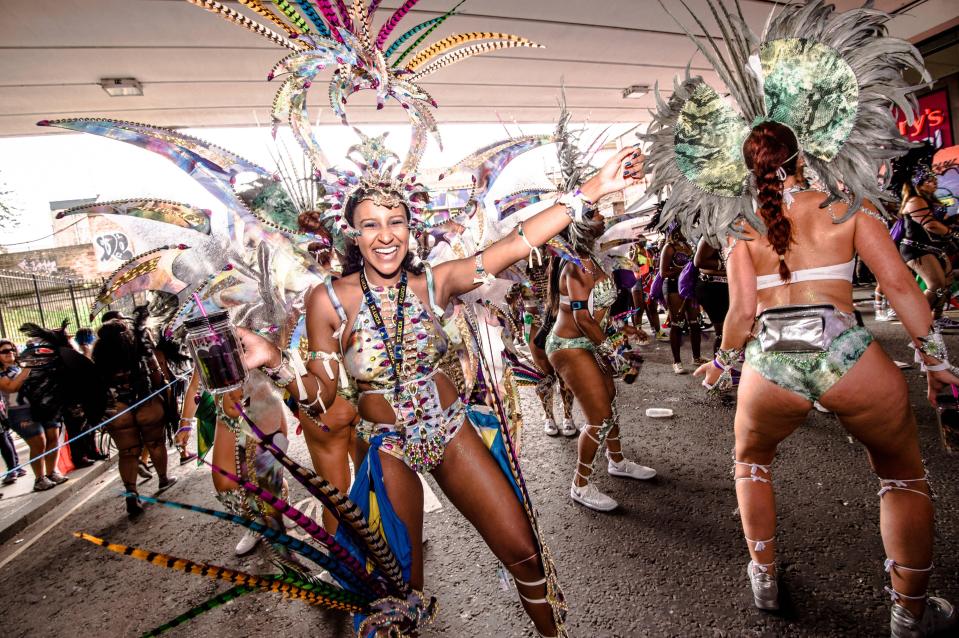  Carnival revellers danced away despite the rain on Sunday