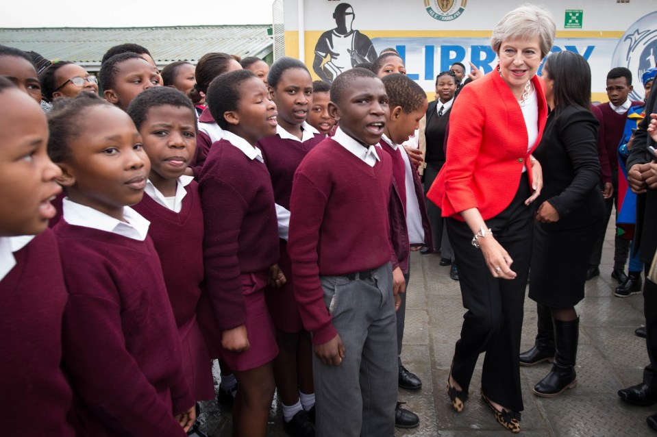 Theresa May engaged in some very awkward dancing in South Africa today