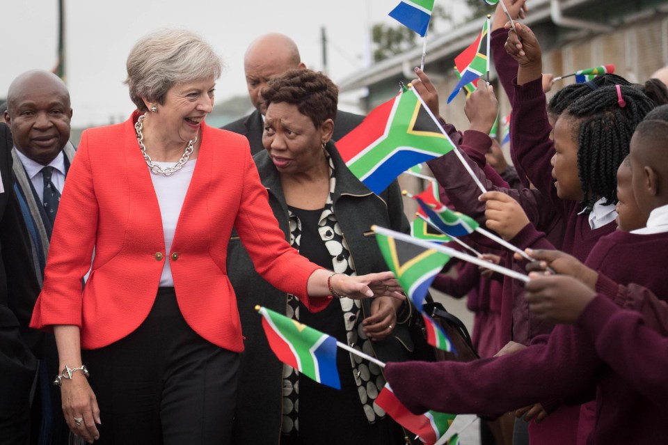 The PM smiled and laughed throughout and later joined in with a second dance in her visit to the I D Mkize School