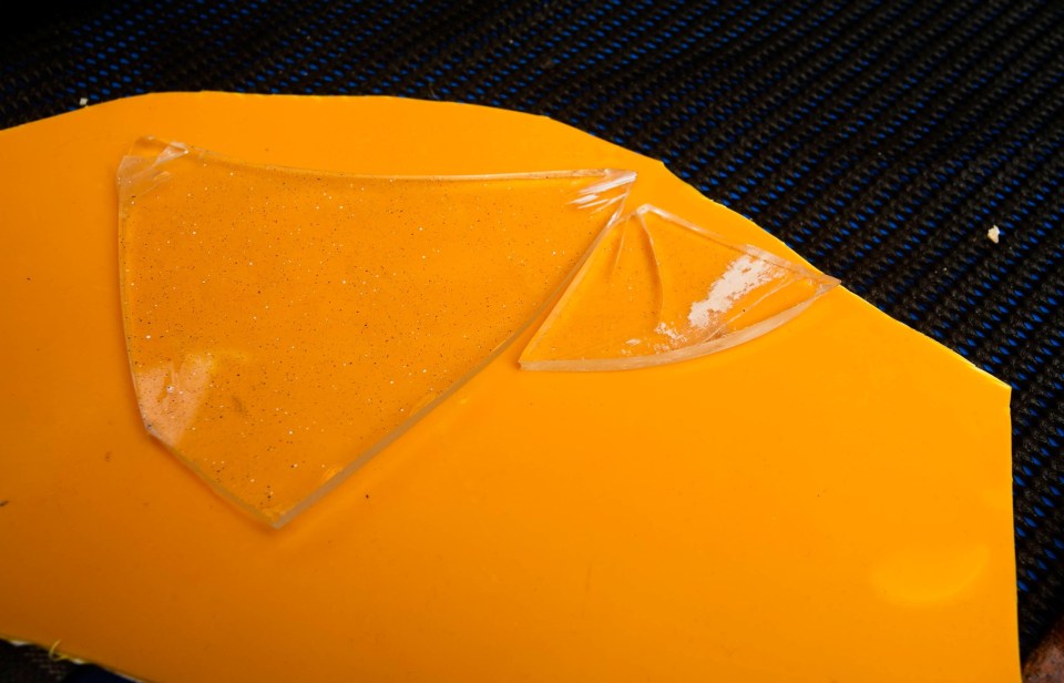 A smashed window onboard of Golden Promise at Brixham Harbour in Devon